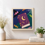 Finished witch book and candies artwork displayed on a wall