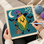 Creating handmade witch corn character punch needle artwork
