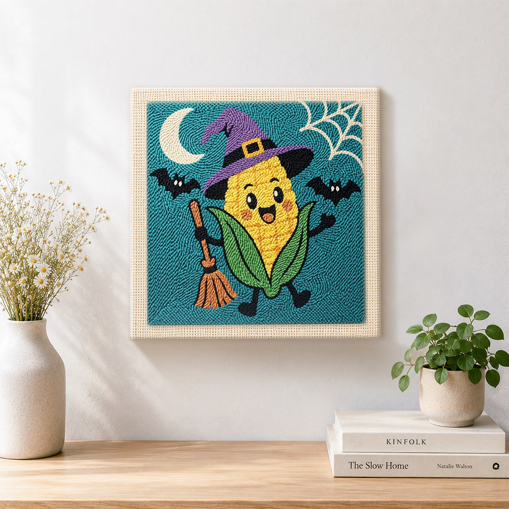 Finished witch corn character artwork displayed on a wall