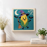Finished witch corn character artwork displayed on a wall