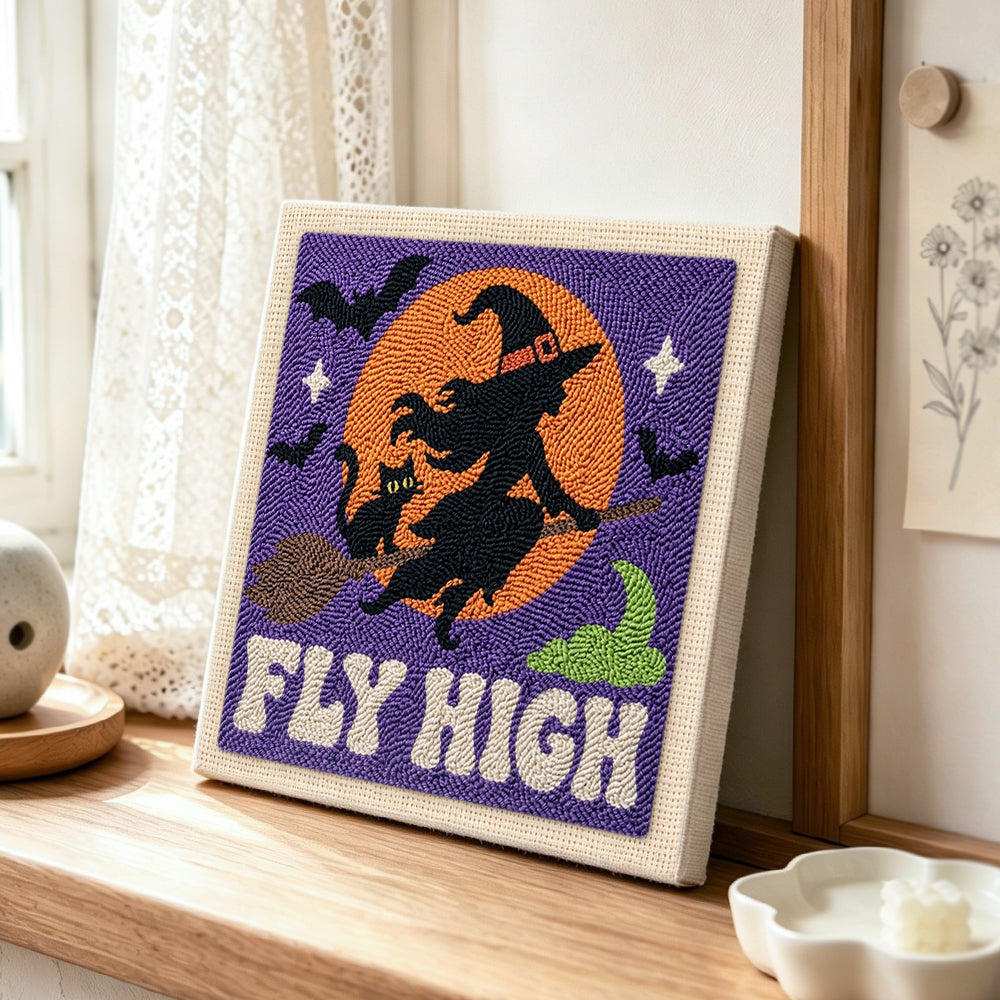 Witch fly high punch needle artwork displayed on a table