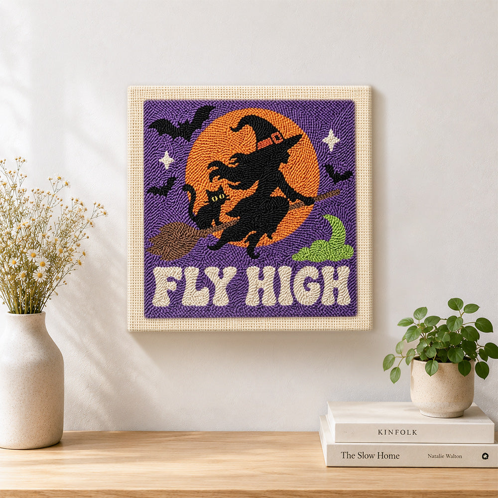Finished witch fly high artwork displayed on a wall
