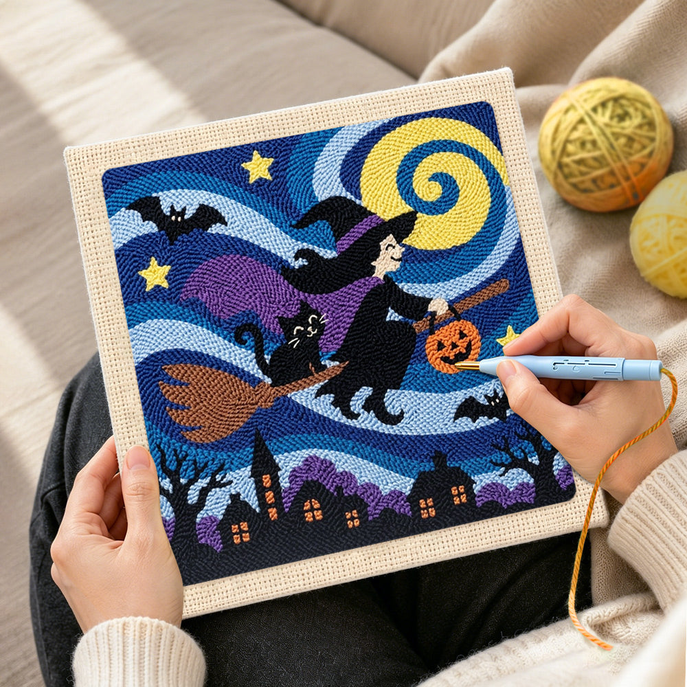 Creating handmade witch flying on broomstick punch needle artwork