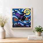 Finished witch flying on broomstick artwork displayed on a wall