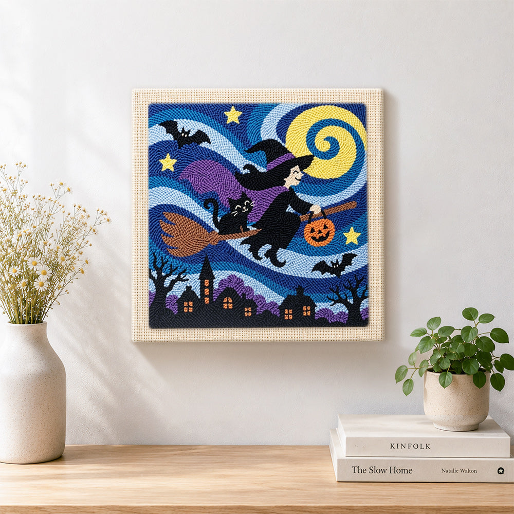 Finished witch flying on broomstick artwork displayed on a wall