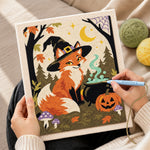Creating handmade witch fox with magic cauldron punch needle artwork