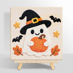 Witch ghost holding pumpkin punch needle kit for beginners
