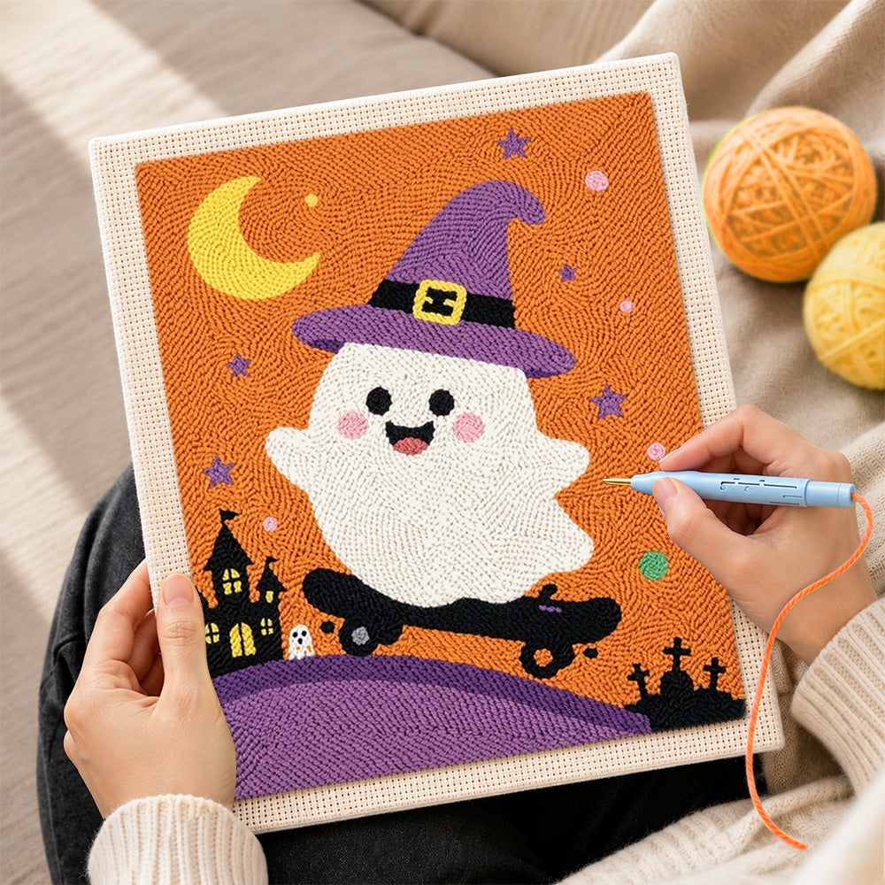 Creating handmade witch ghost on a skateboard punch needle artwork