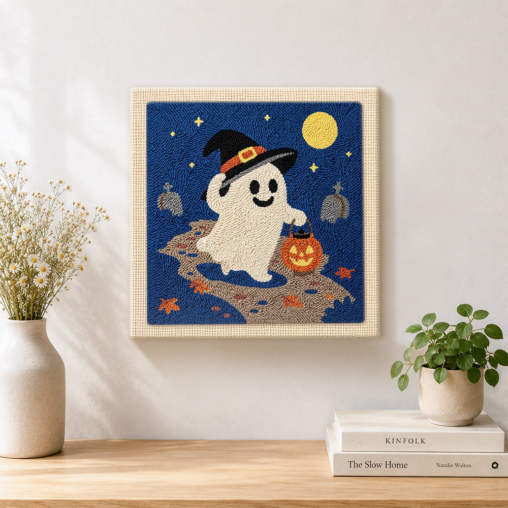 Finished witch ghost trick‑or‑treat artwork displayed on a wall