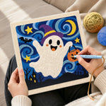 Creating handmade witch ghost with candy bucket punch needle artwork