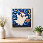 Finished witch ghost with candy bucket artwork displayed on a wall