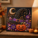 Finished witch hat and pumpkin pearl diamond painting artwork displayed as holiday home decor