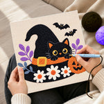 Creating handmade witch hat black cat punch needle artwork
