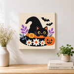 Finished witch hat black cat artwork displayed on a wall
