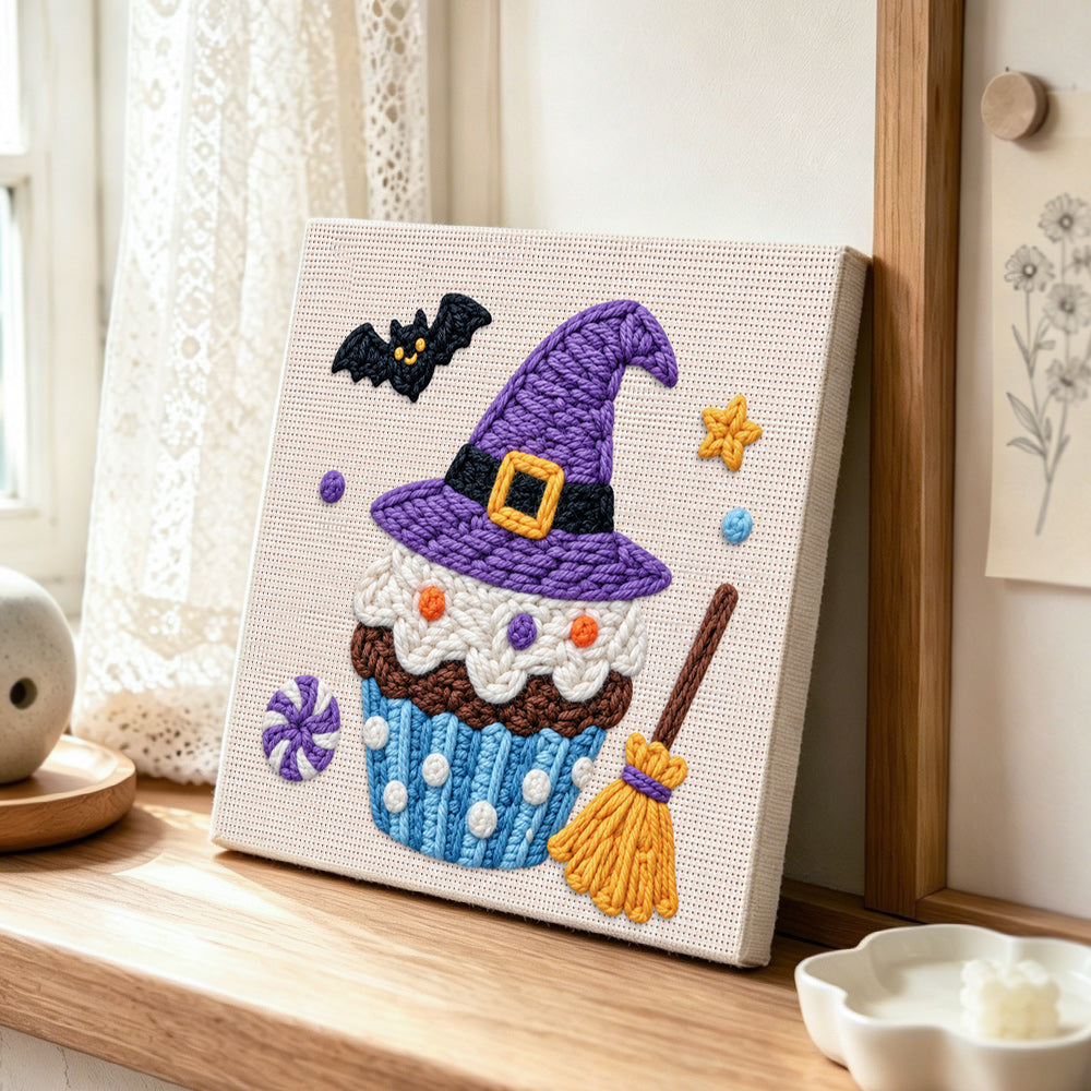 Witch hat cupcake punch needle artwork displayed on a table