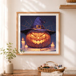 Finished witch hat pumpkin cross stitch artwork displayed as home decor