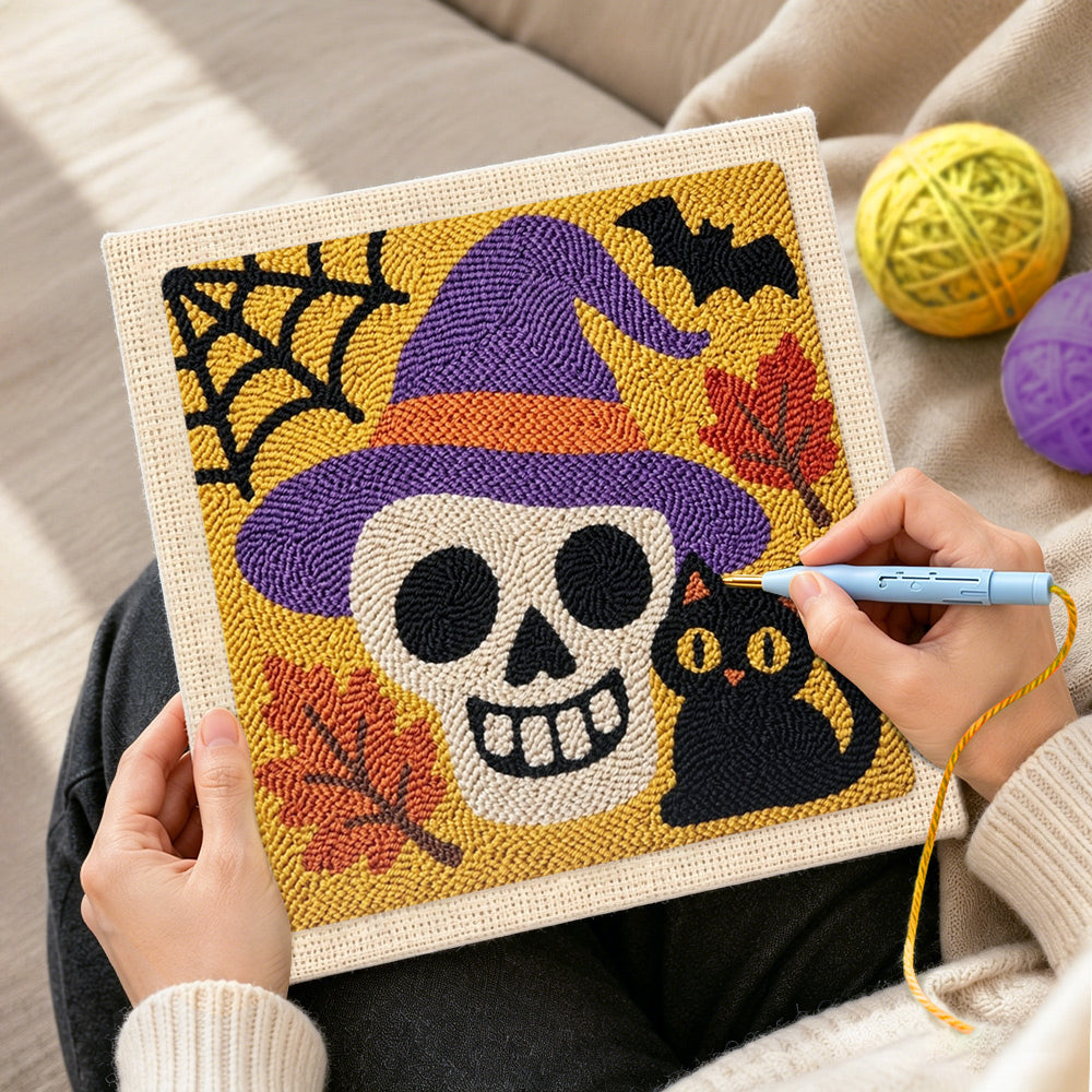 Creating handmade witch hat skull and black cat punch needle artwork