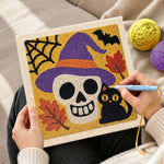Creating handmade witch hat skull and black cat punch needle artwork