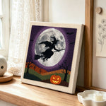 Witch moon flight punch needle artwork displayed on a table