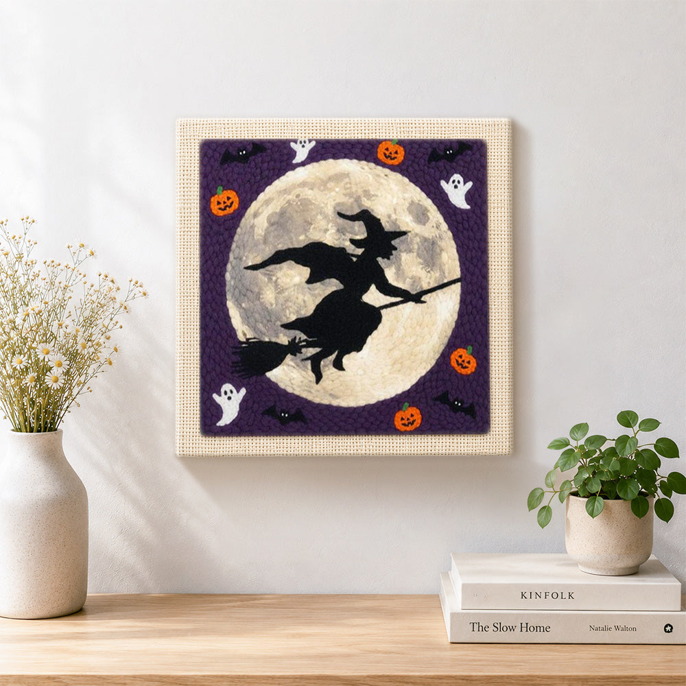 Finished witch moon silhouette artwork displayed on a wall