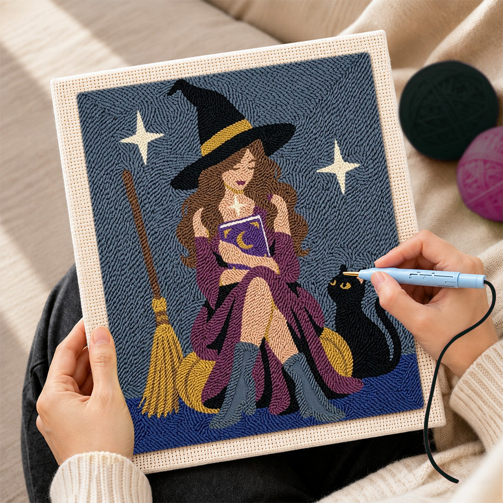 Creating handmade witch reading magic book with cat punch needle artwork