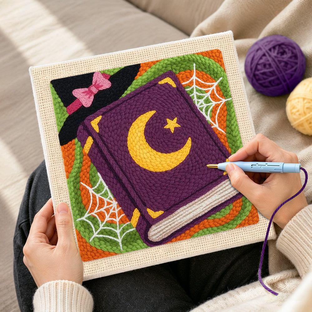 Creating handmade witch spell book punch needle artwork