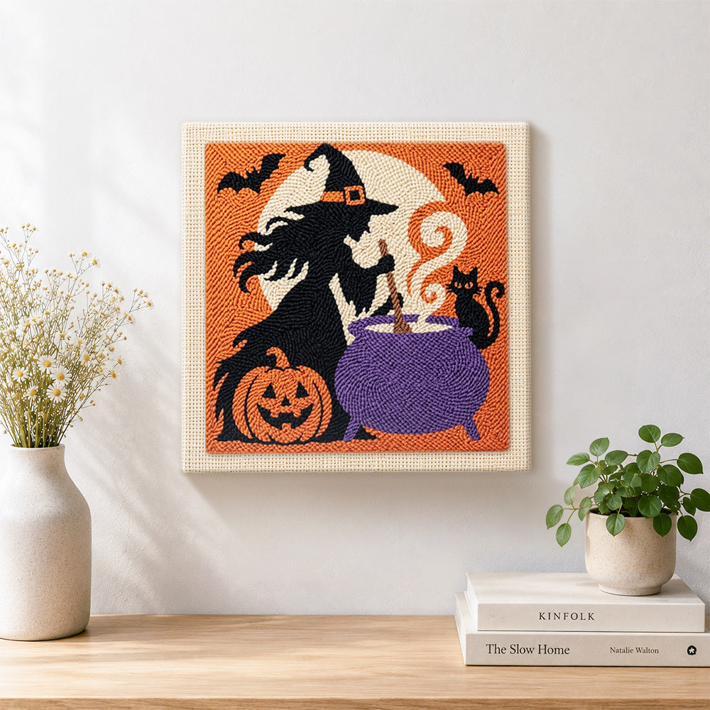 Finished witch stirring magic cauldron artwork displayed on a wall