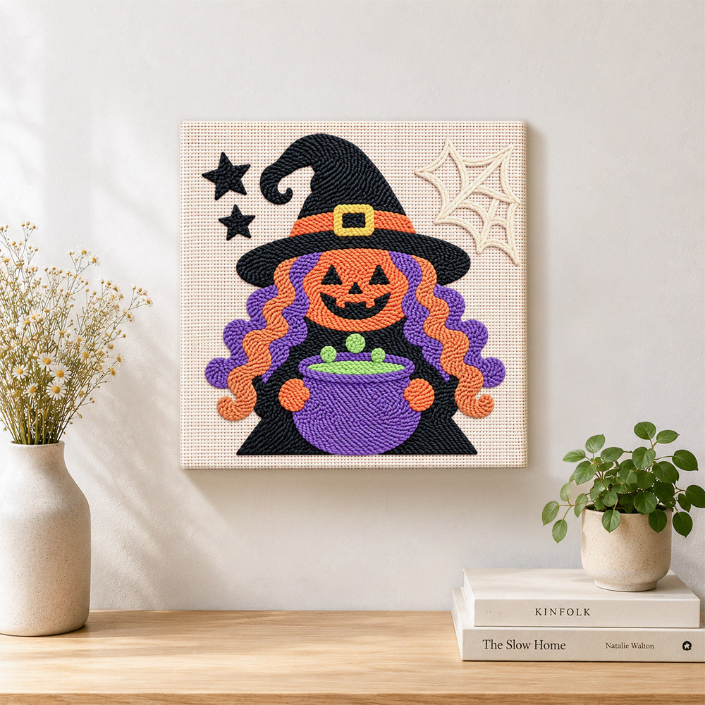 Finished witch with magic cauldron artwork displayed on a wall
