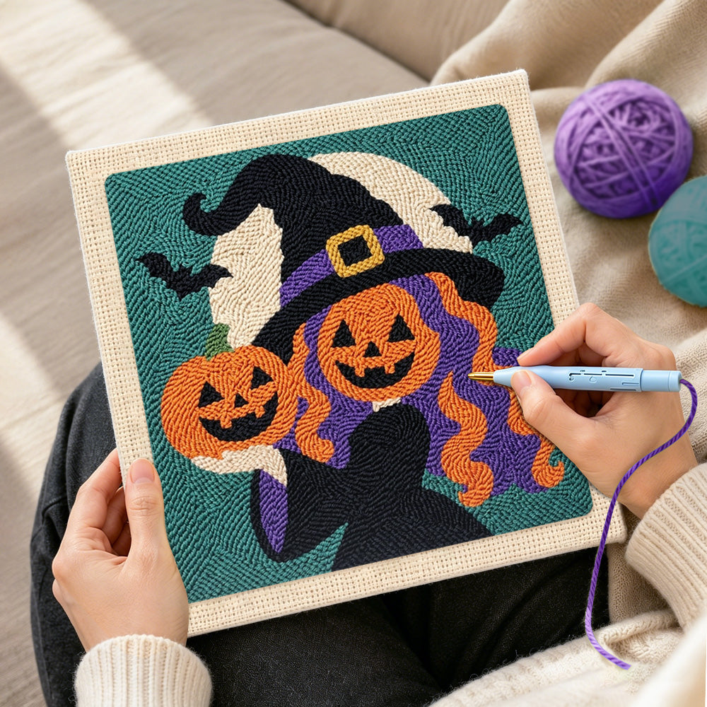Creating handmade witch with pumpkin heads punch needle artwork
