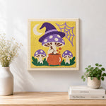 Finished witchy mushrooms artwork displayed on a wall