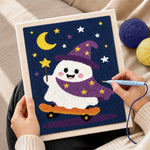 Creating handmade wizard ghost on skateboard punch needle artwork