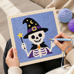 Creating handmade wizard skeleton punch needle artwork