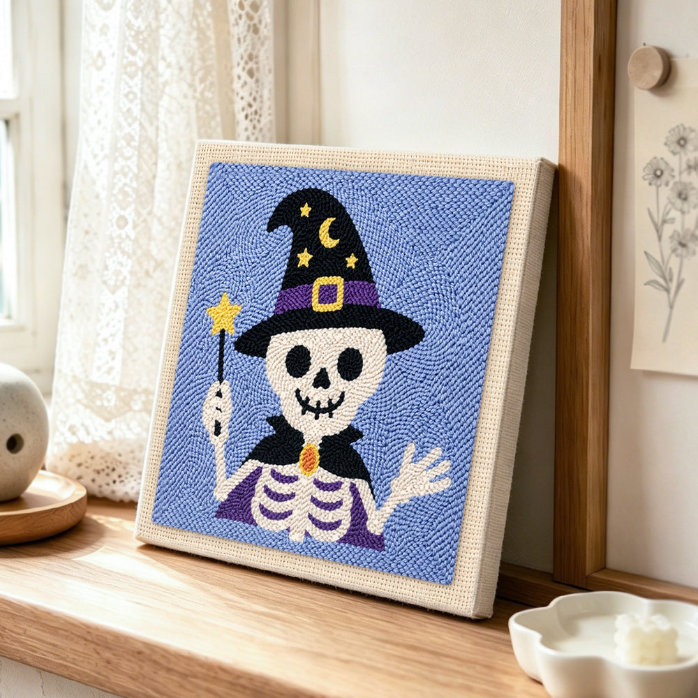 Wizard skeleton punch needle artwork displayed on a table