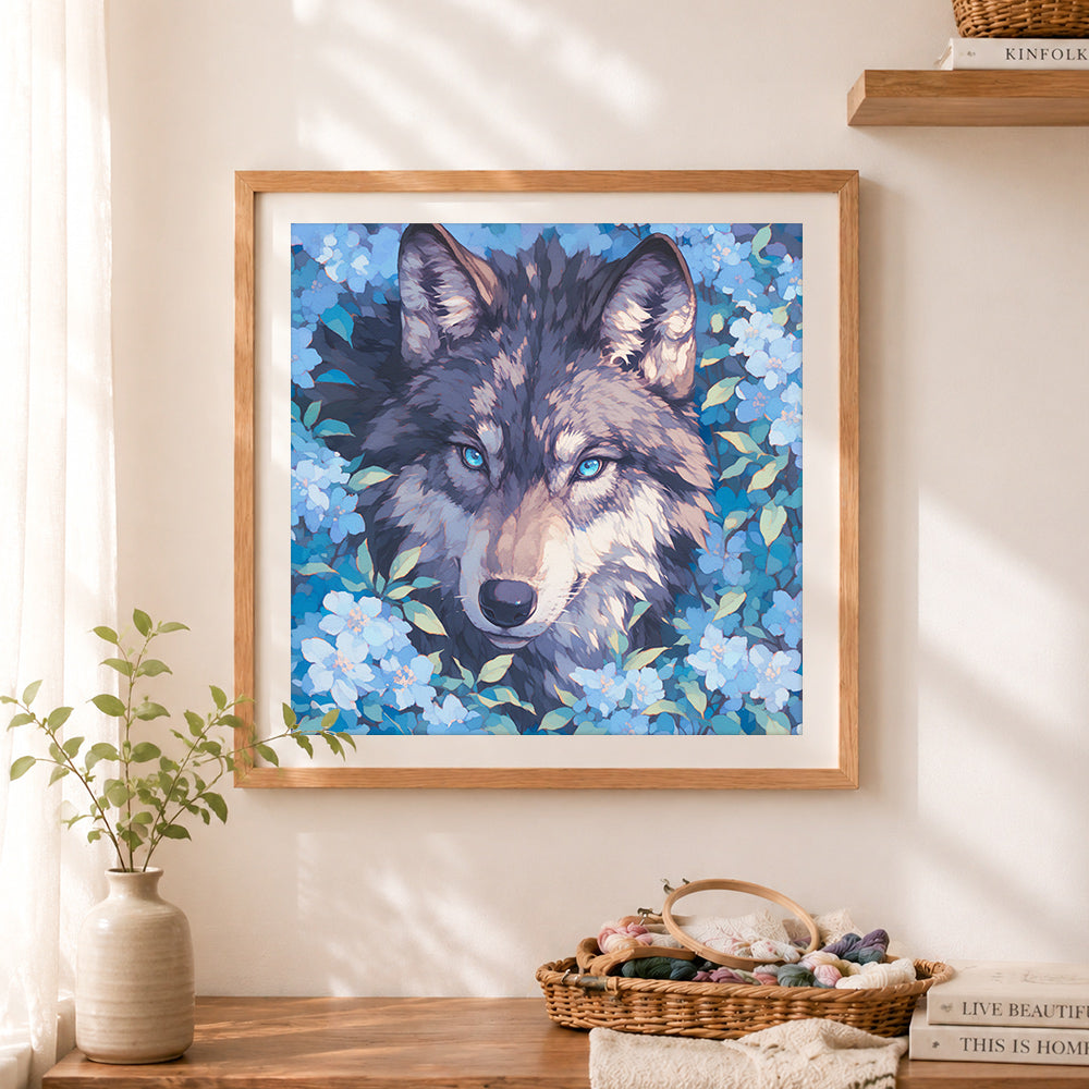 Finished wolf hidden in blue florals cross stitch artwork displayed as home decor