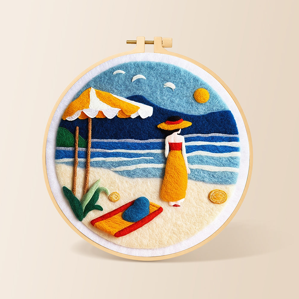 Woman and parasol on the beach needle felting kit for beginners with a round wooden frame
