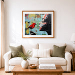 Finished woman face with red bird cross stitch artwork displayed as home decor
