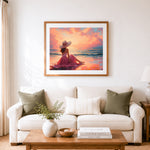 Finished woman watching sunset at beach cross stitch artwork displayed as home decor