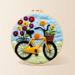Yellow bicycle with flowers needle felting kit for beginners with a round wooden frame