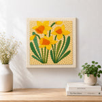 Finished yellow daffodils artwork displayed on a wall